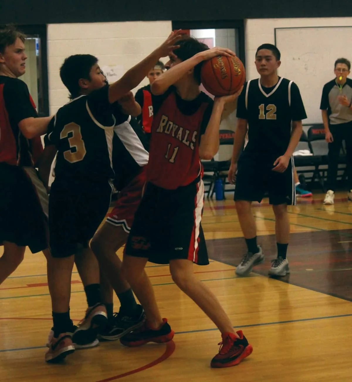 Junior Boys Basketball: Pass or shoot!