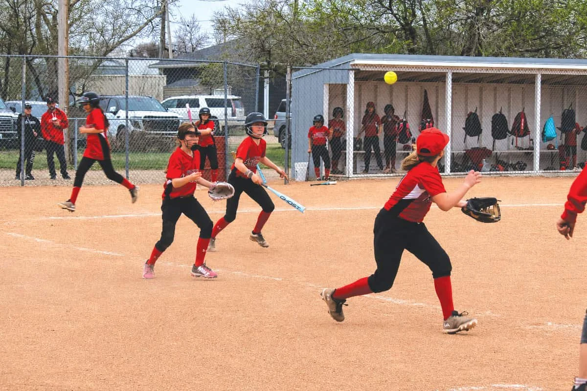 U11 Softball Hit