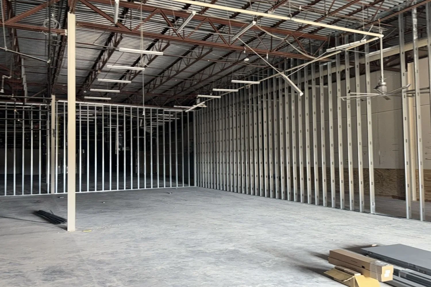 Commercial interior framing with metal studs during construction by JECAM