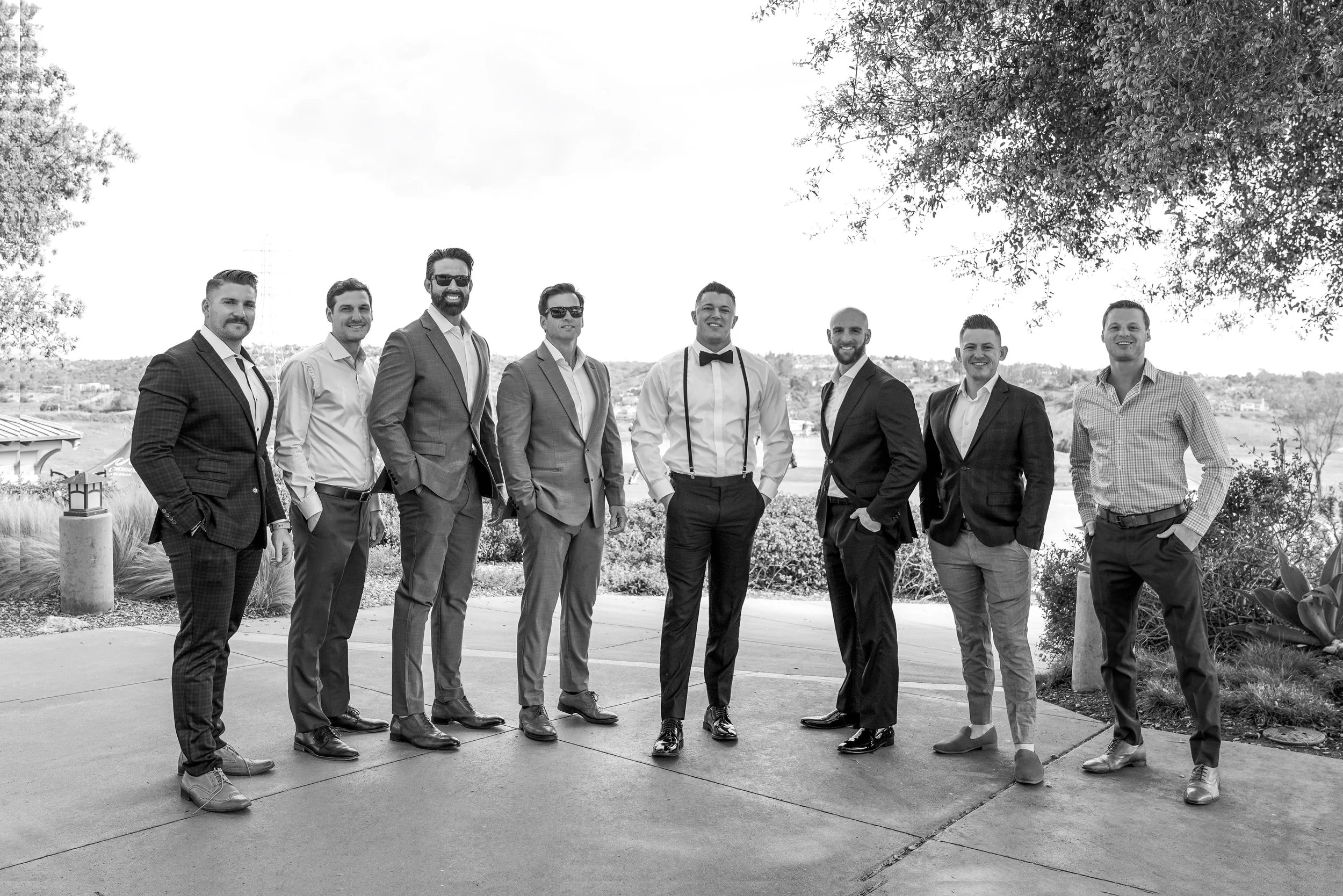 Groom and groomsmen portrait in Carlsbad wedding at the Crossings, captured in a classic black and white photography style.