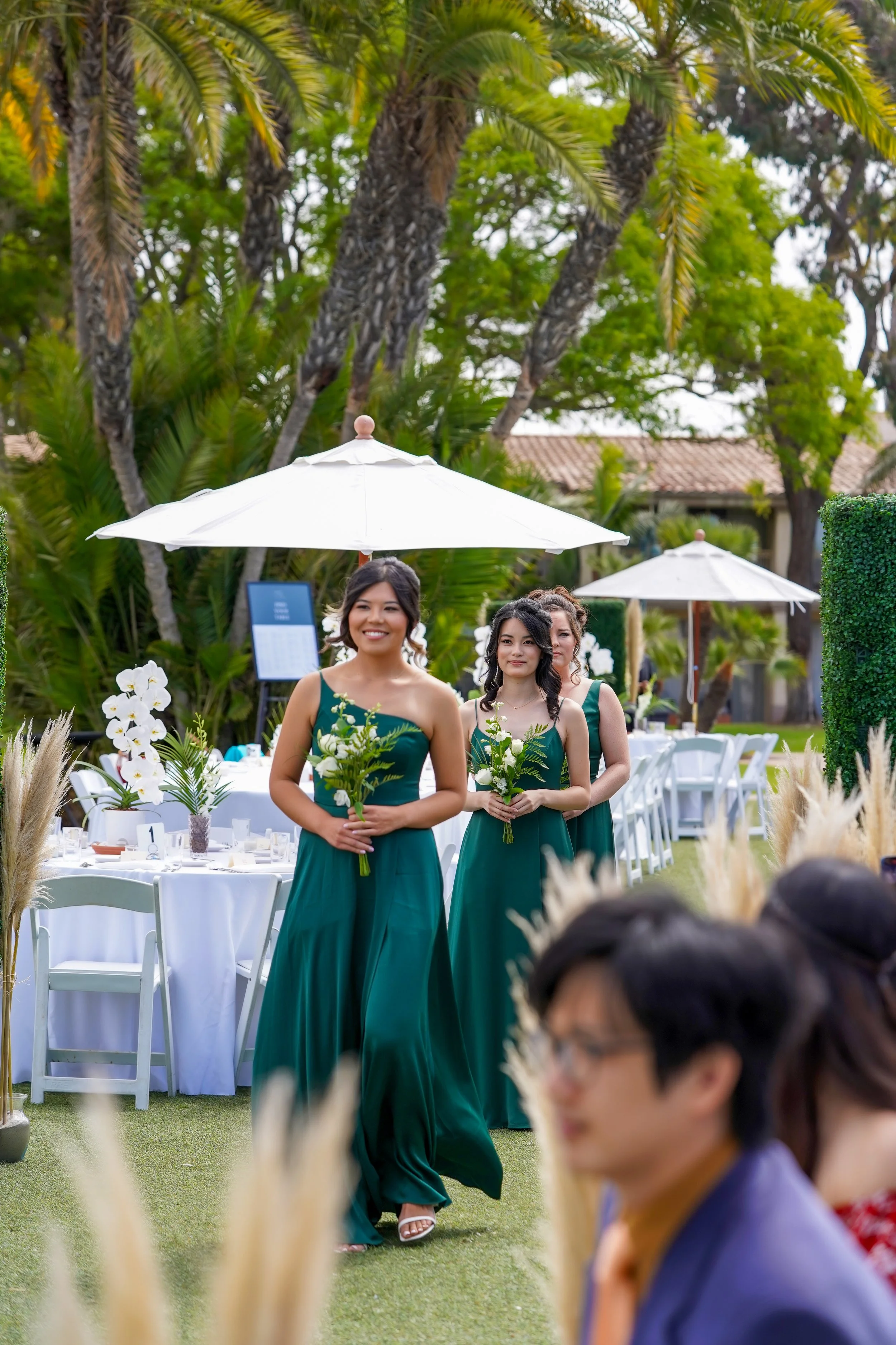emerald-bridesmaids-walking-aisle.JPG