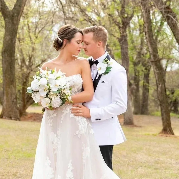 Bridal Low updo, elegant; by Stephanie Renee Bridal  Oklahoma City