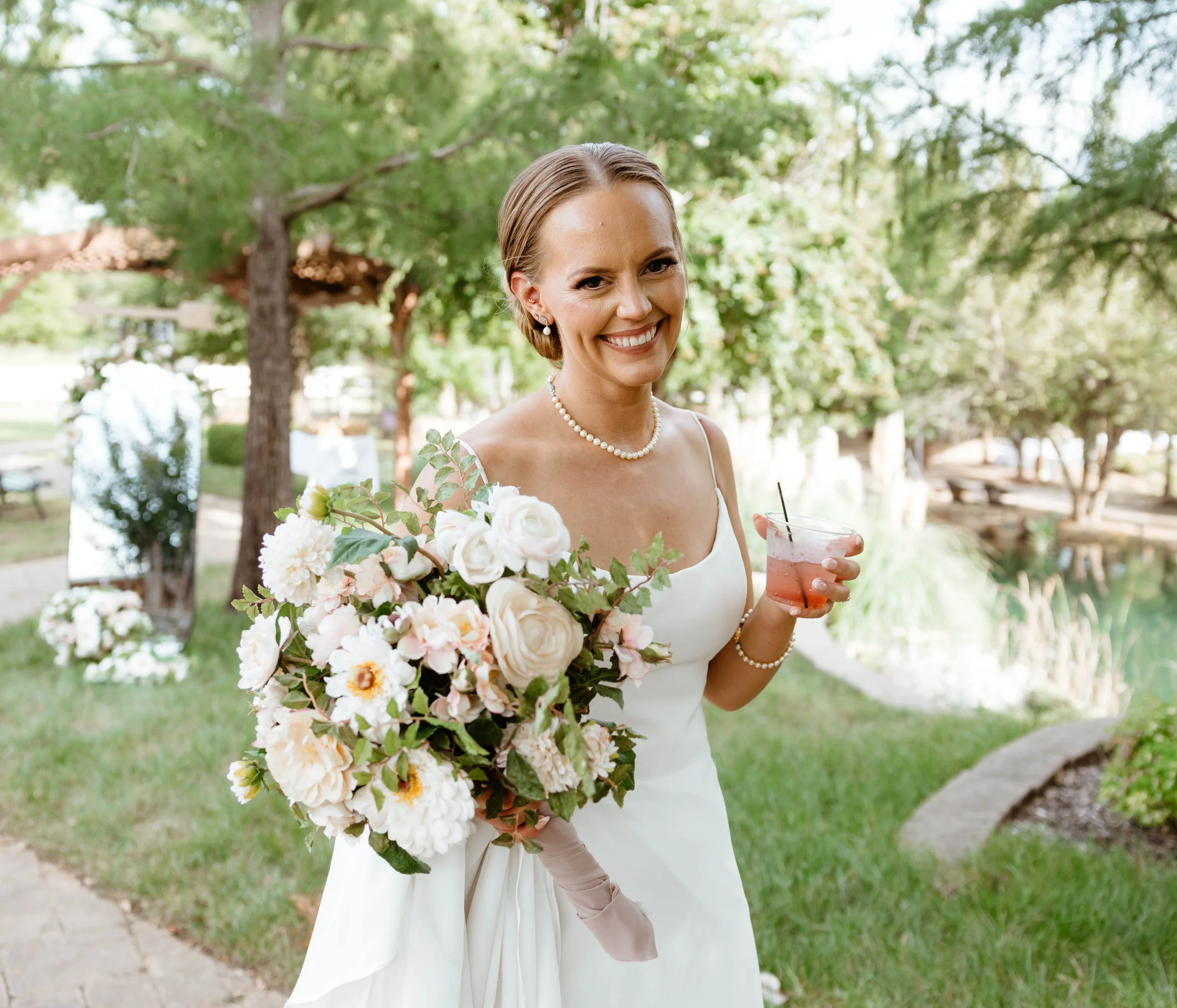 Bridal Low updo, elegant; by Stephanie Renee Bridal in  Oklahoma City