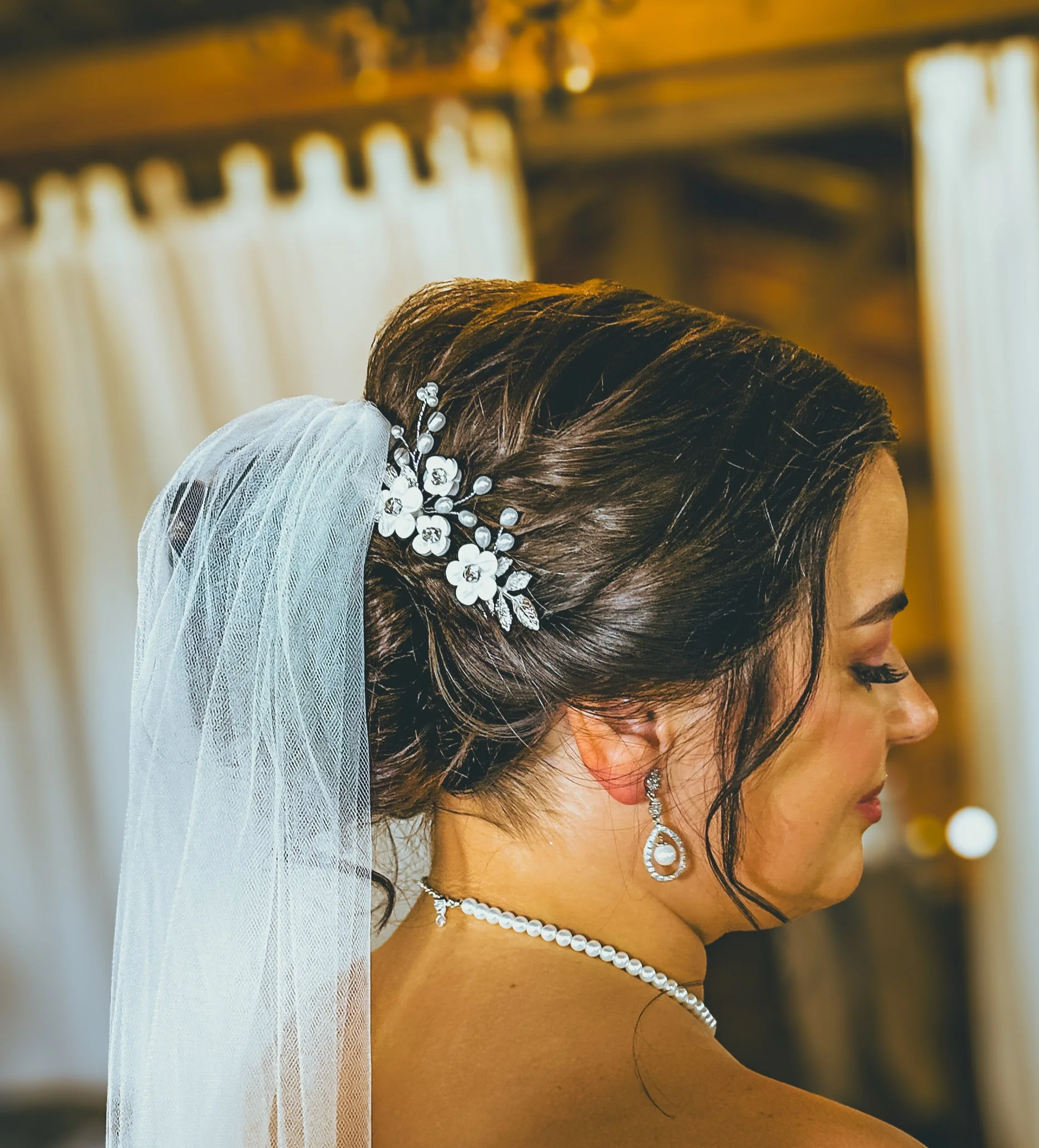 Bridal Low updo, elegant; Stephanie Renee Bridal Hair ; Oklahoma City