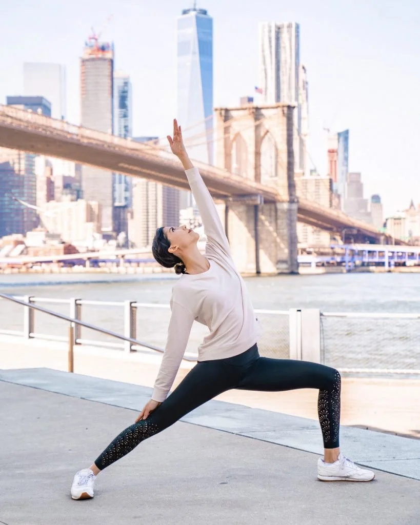 yoga in front of city scape
