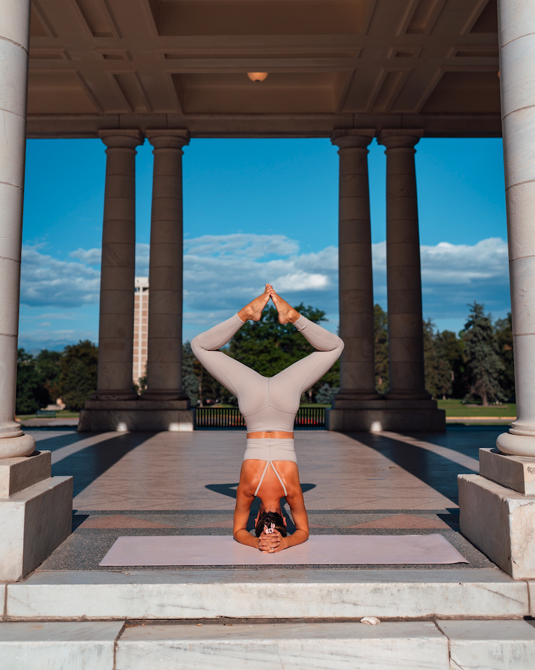 woman doing a headstand