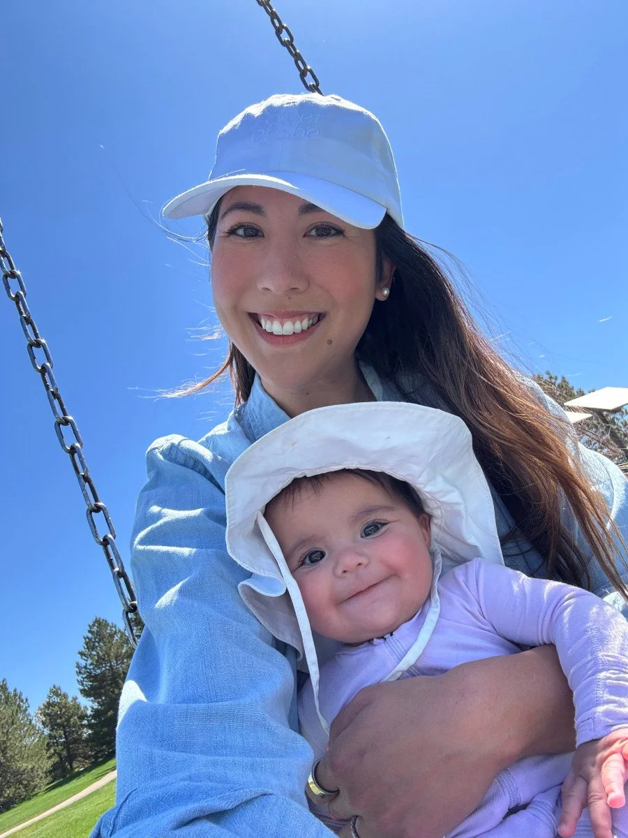mom and baby on swing