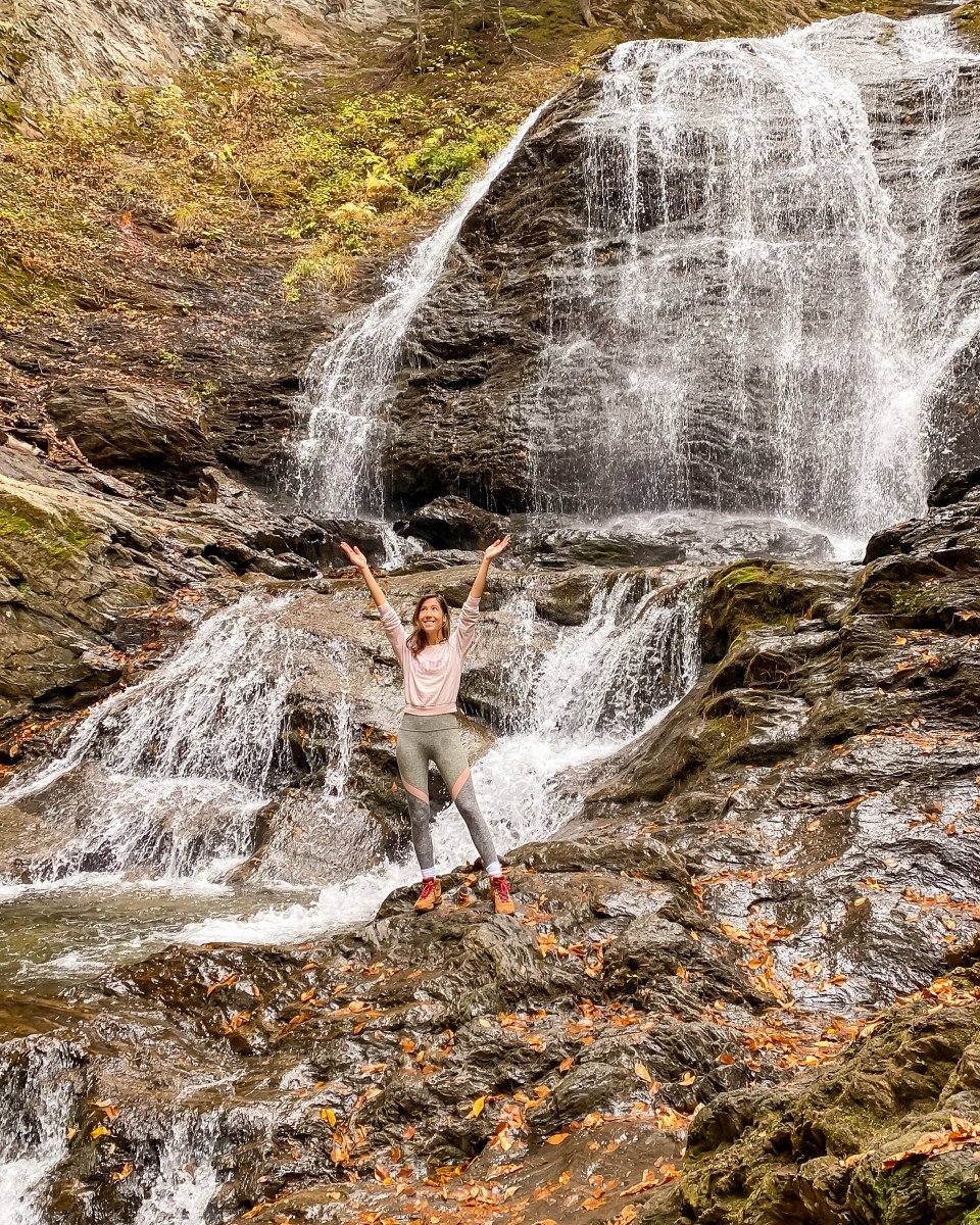 woman standing in falls