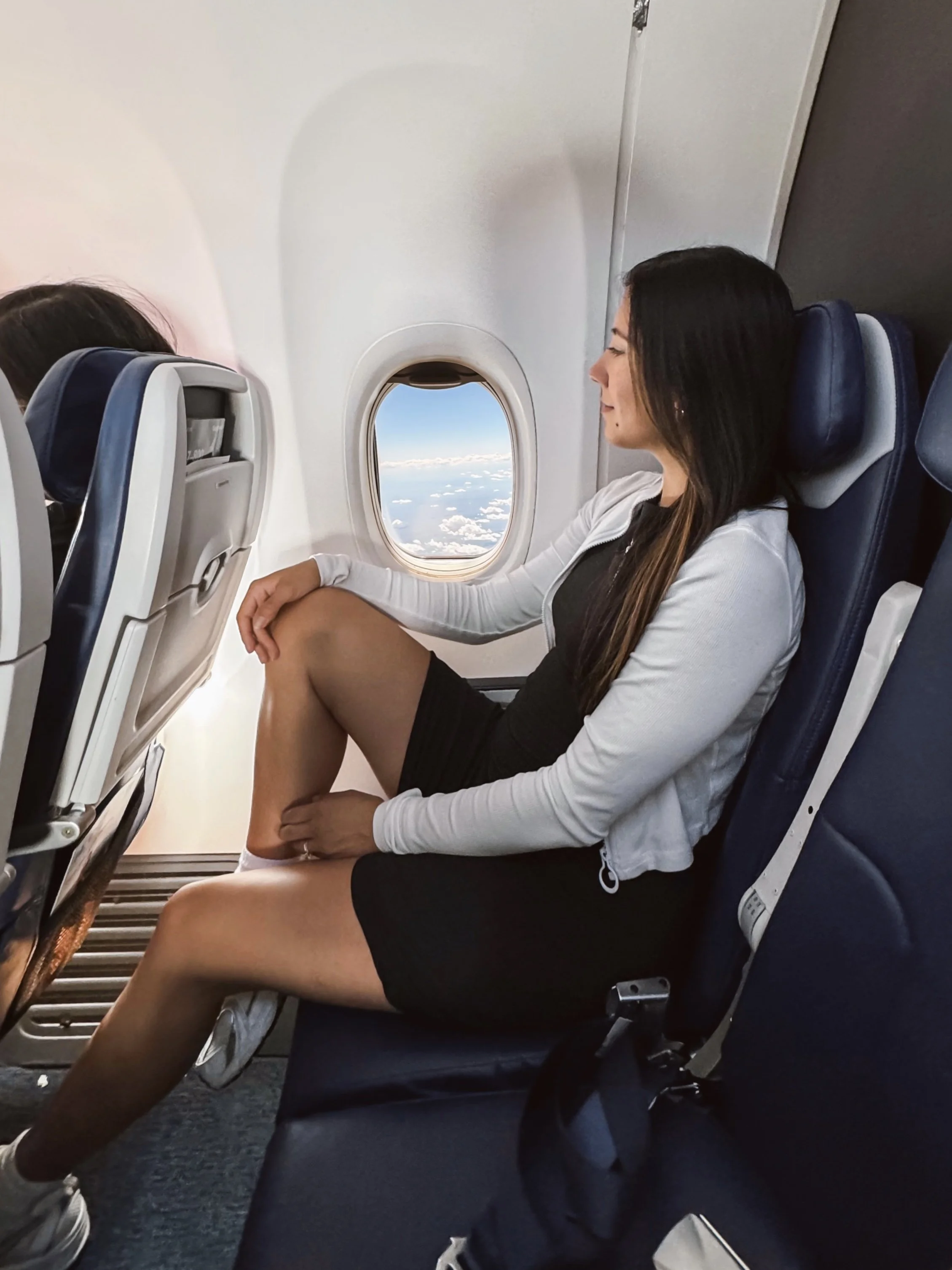 GIRL ON AIRPLANE