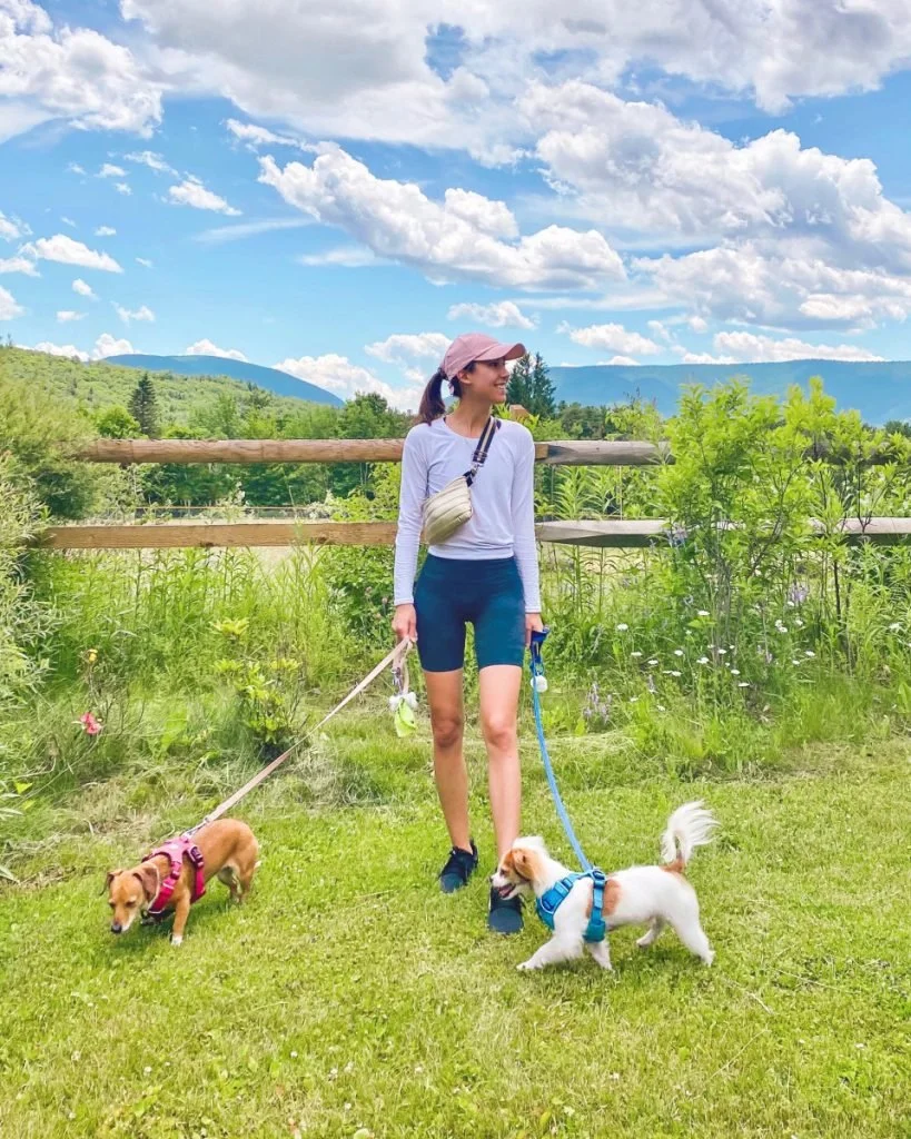 girl with two dogs
