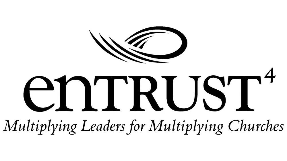 Logo for EnTRUST, with the slogan "Multiplying Leaders for Multiplying Churches" underneath.
