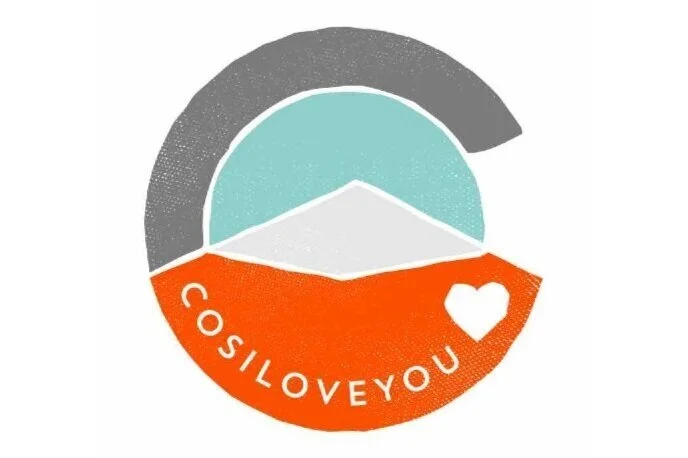 A circular graphic with mountains, sky, and a heart, containing the text 'COsILOVEYOU'.