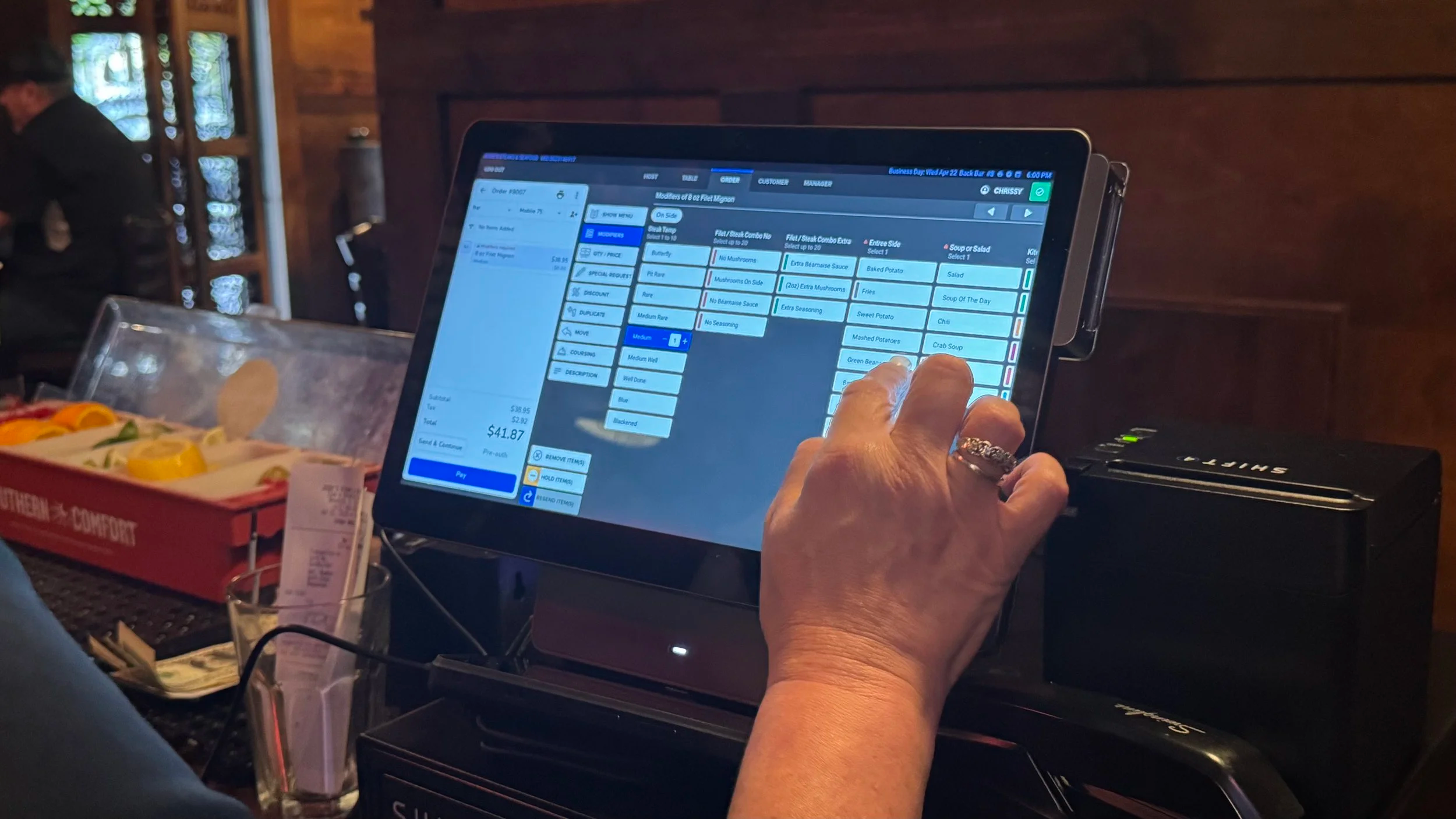 SkyTab POS terminal in use by bartender