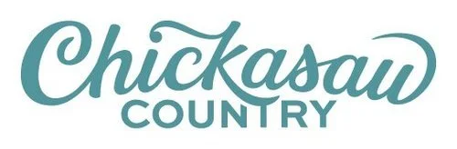 Text reading "Chickasaw County" in a stylized font