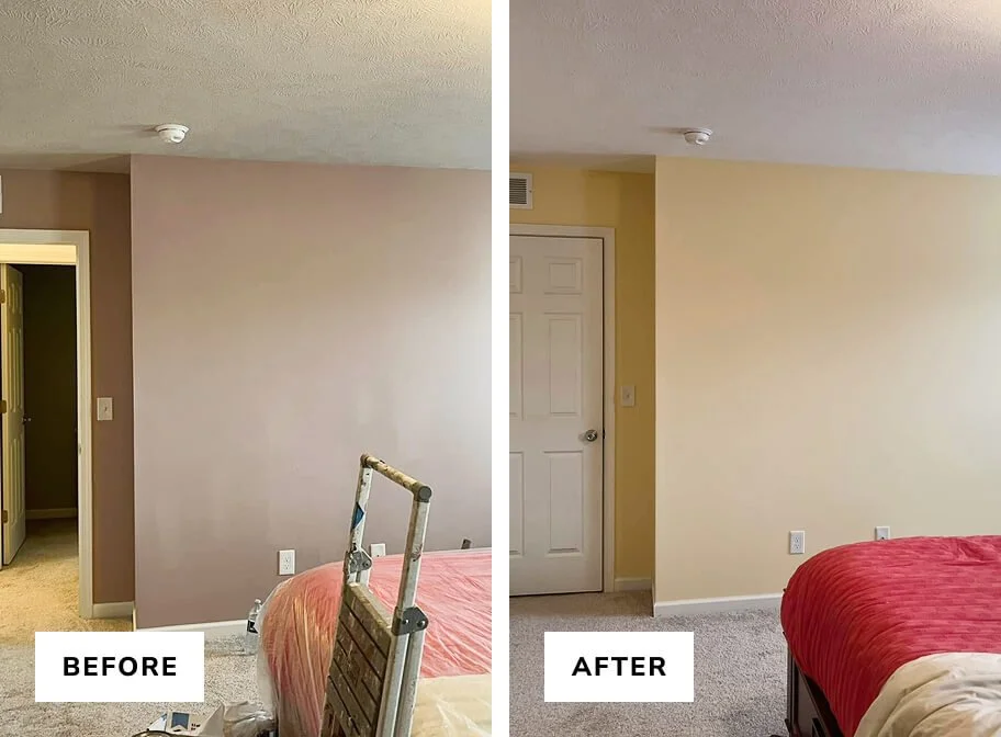 Side-by-side comparison of a bedroom wall before and after being painted. The left shows a wall painted in a muted mauve color, with a ladder and a partially visible bed with a reddish cover. The right shows the same wall painted in a light beige or off-white color, with the bed now having a red blanket.