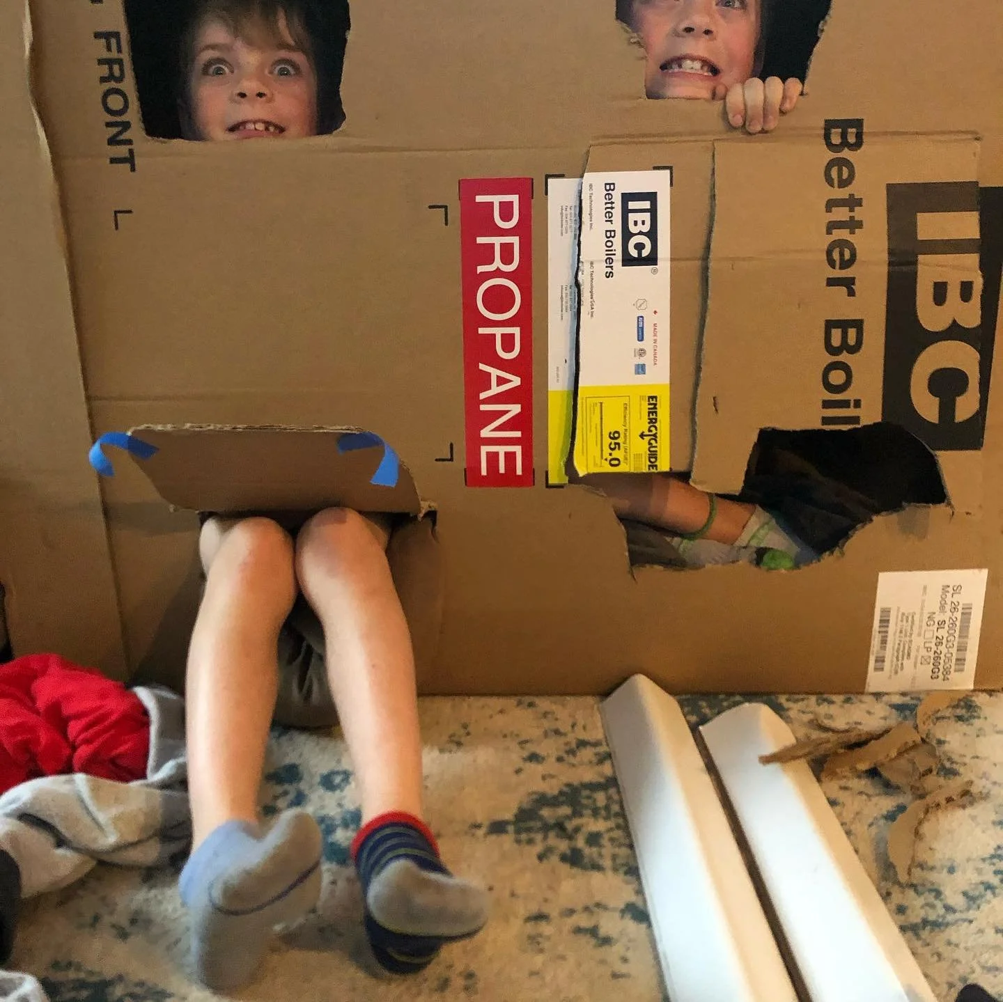 Small business on an island means a lot of boxes. The boys have grown up with building anything with boxes over toys. You name it&hellip;they&rsquo;ve made it or destroyed it! Endless Cardboard and always a messy yard. #twins #cardboardbox