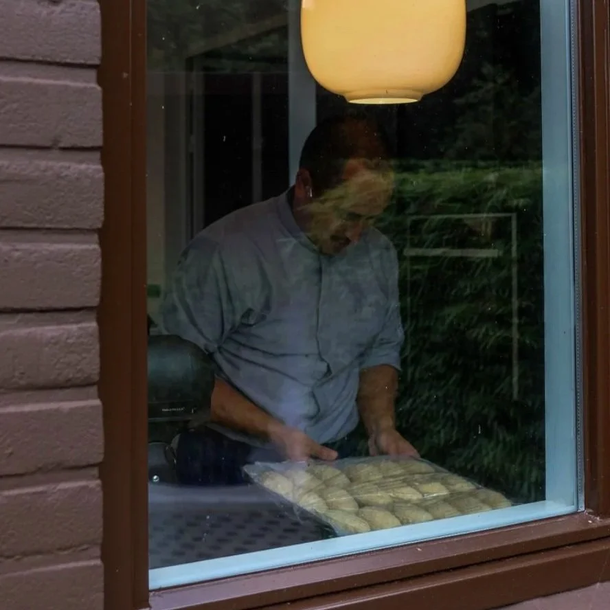 Cook preparing new snacks on countertop