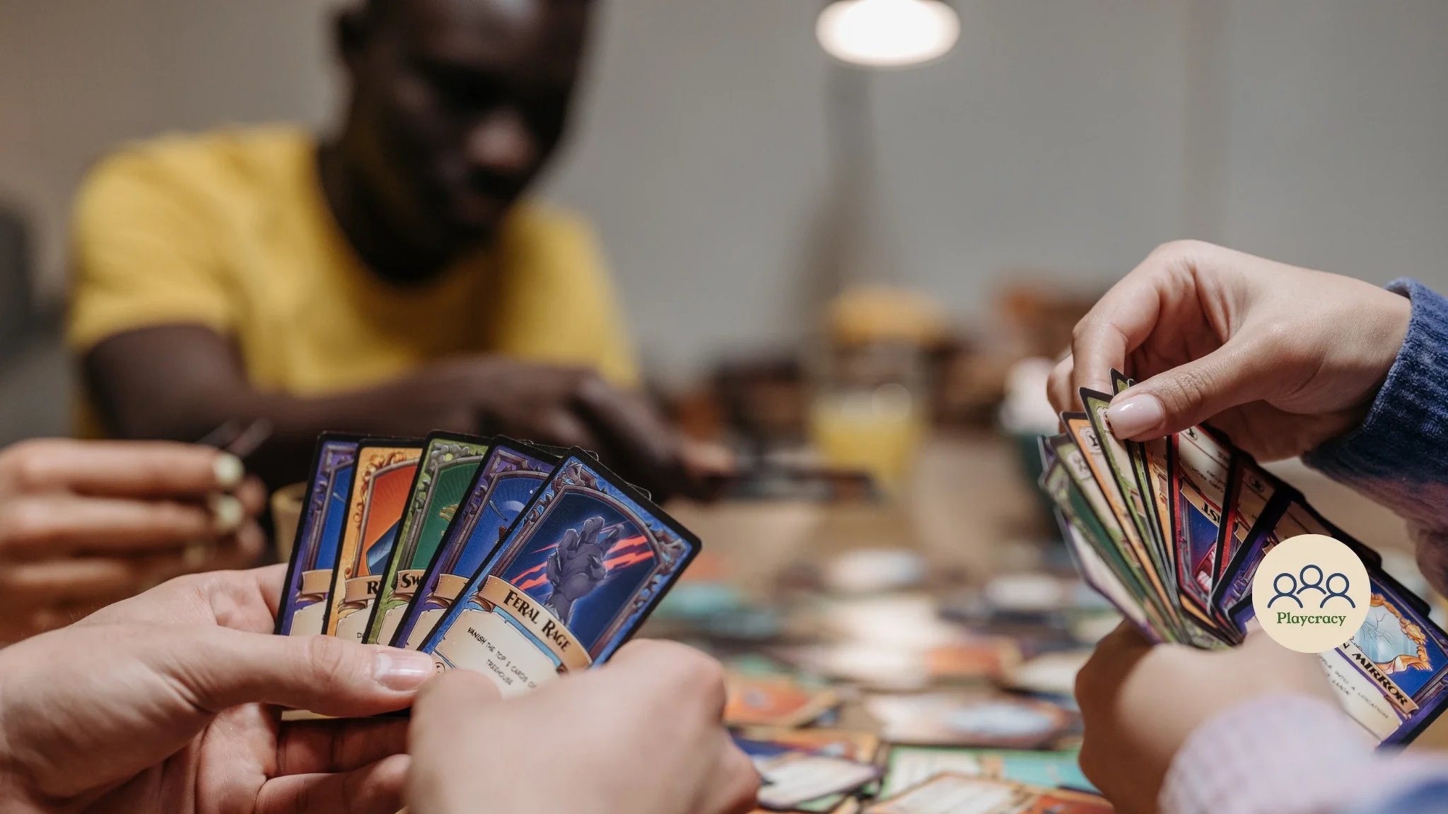 Players hold their cards and are about to play their card of choice