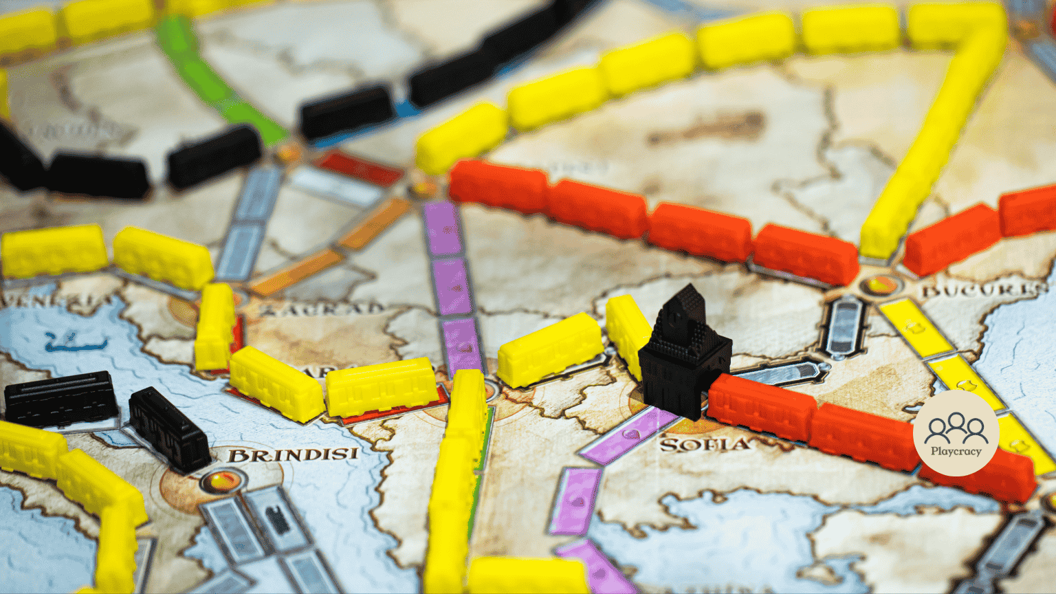 The map of the board game 'Ticket to Ride', with meeples on top