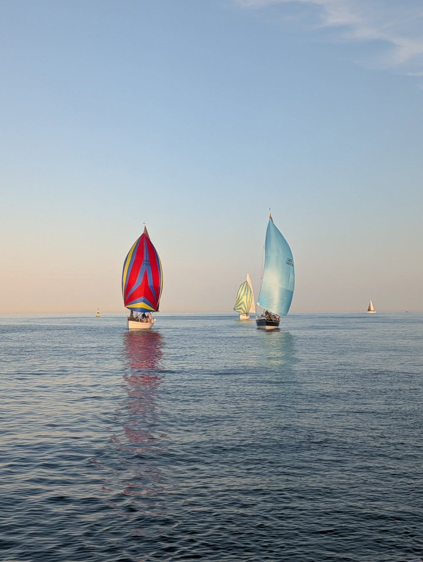 The lack of wind resulted in yesterday's race being one the longest I've participated in, we crossed the finishing line just after 9:00 pm!

Nevertheless it was a beautiful evening on the water, imo you seriously can't beat @lovepooleuk at this time 