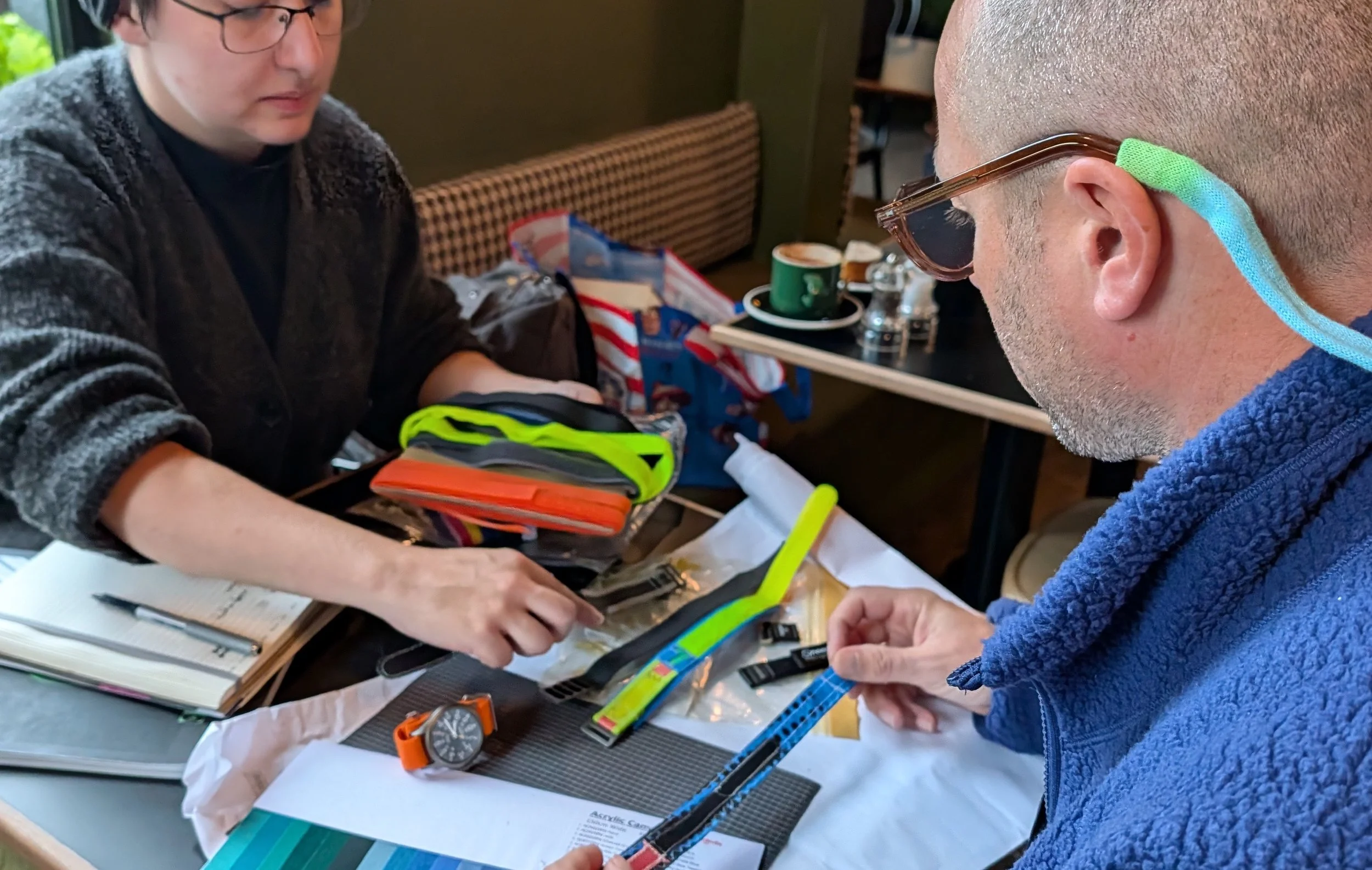 people looking at material