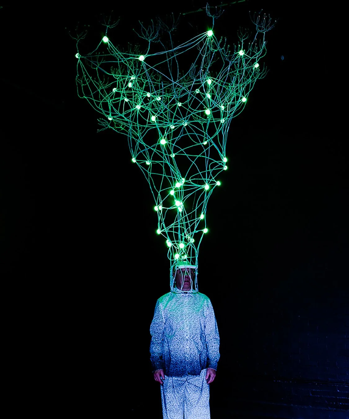 "Unwinding the Universe" invites audiences into a vivid, sensory world where art and science meet. Conceived and performed by Malcolm McClay in collaboration with Jeff Becker, this multidisciplinary work blends live performance, large-scale sculpture