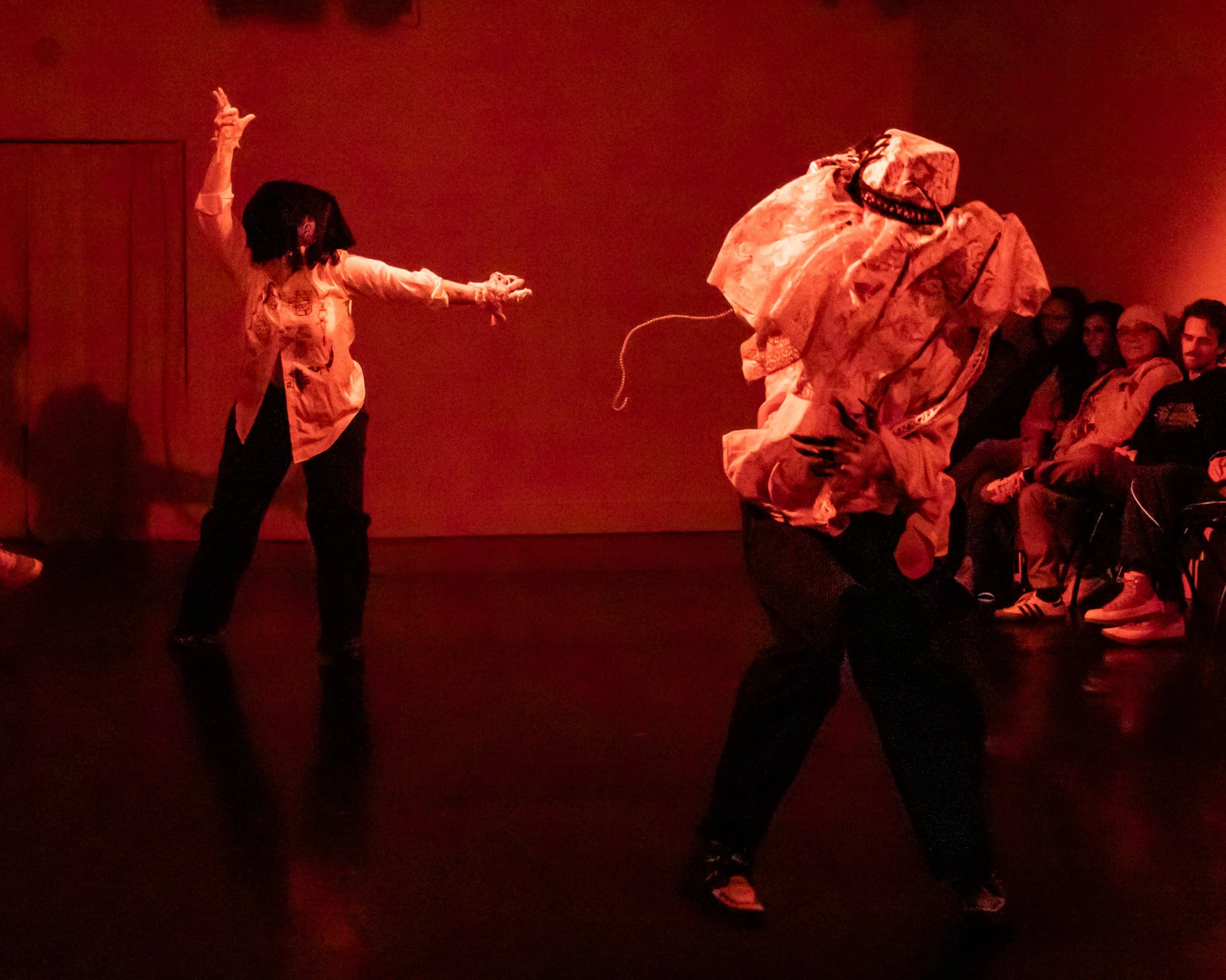 "Ghost-riders" is a theatrical dance piece about romance, queerness and longing. Two performers enter, adorned in intricate costumes which obscure their human forms. They move towards each other as ghostly apparitions. Tension builds, slowly the char