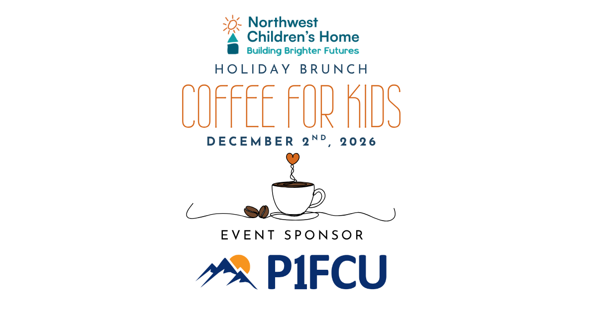 A black travel mug with a handle, displaying the logo of Northwest Children's Home, Inc., placed on a wooden surface with a blue, bokeh background.