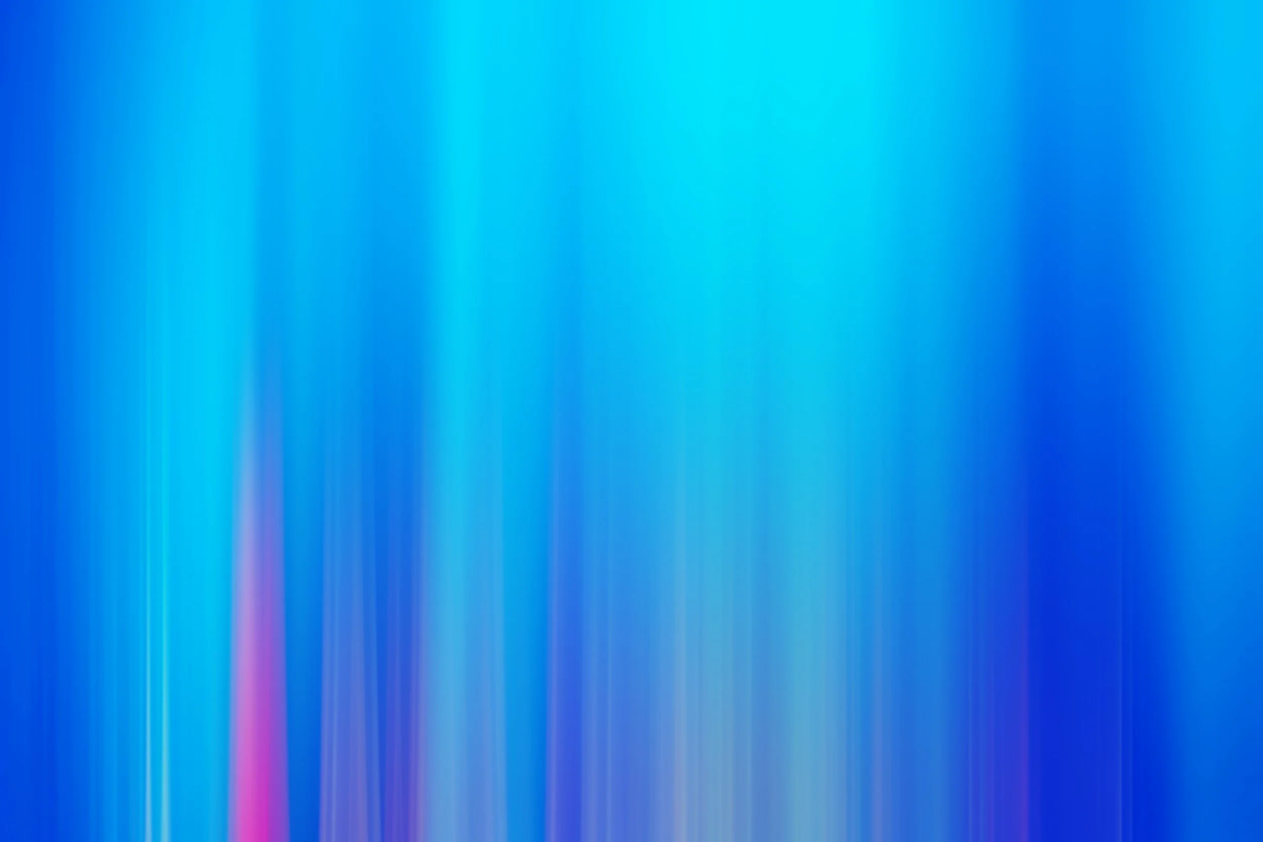 Abstract gradient background with vertical streaks in shades of blue, purple, and teal.