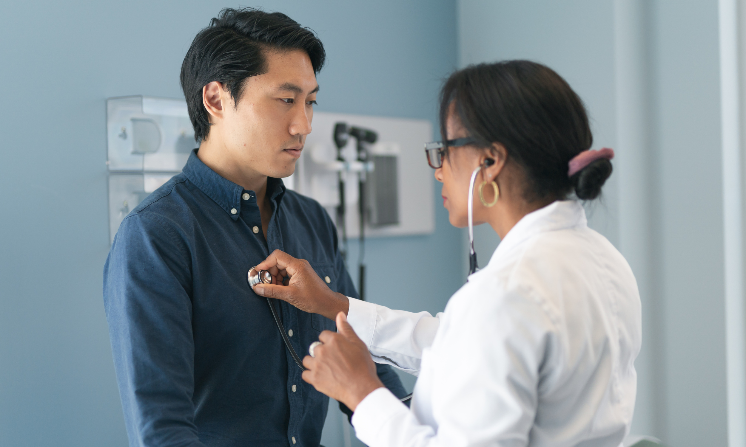 Employee receiving a routine checkup from a healthcare provider