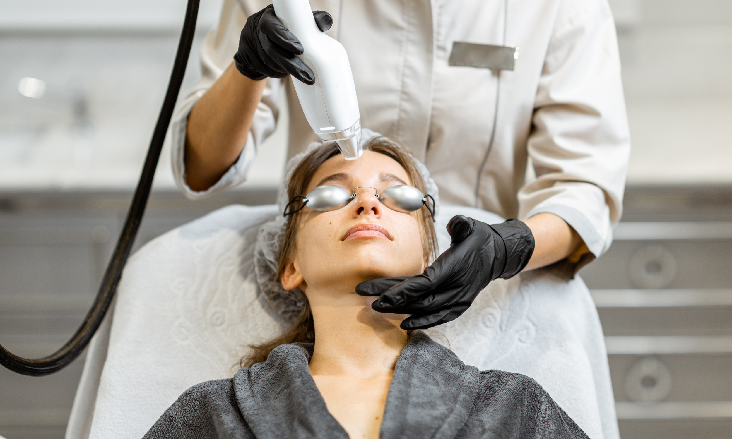 Esthetician performing skin resurfacing treatment in Fort Mill, SC