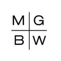 A logo with four quadrants, each containing a letter: M, G, B, and W, separated by lines.
