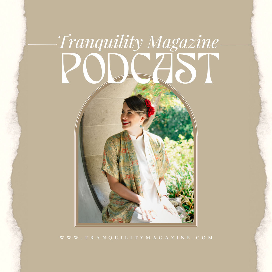 Cover of Tranquility Magazine Podcast featuring Jasmine Maya Royce, sitting outdoors in sunlight with greenery in the background, wearing a patterned jacket, white top, and a red flower in her hair.