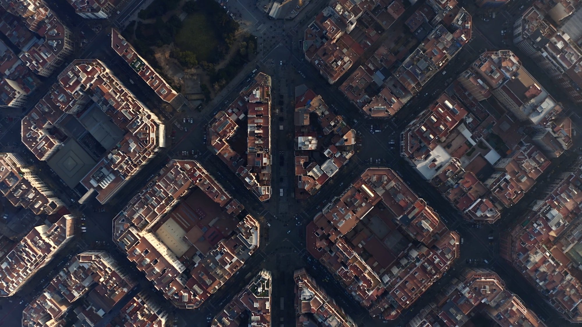 Aerial view of a city with densely packed buildings and streets.
