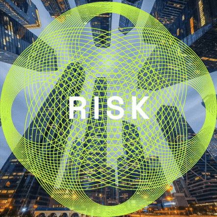 A cityscape at night with tall buildings, overlaid with a large yellow wireframe sphere containing the word 'RISK' in white.