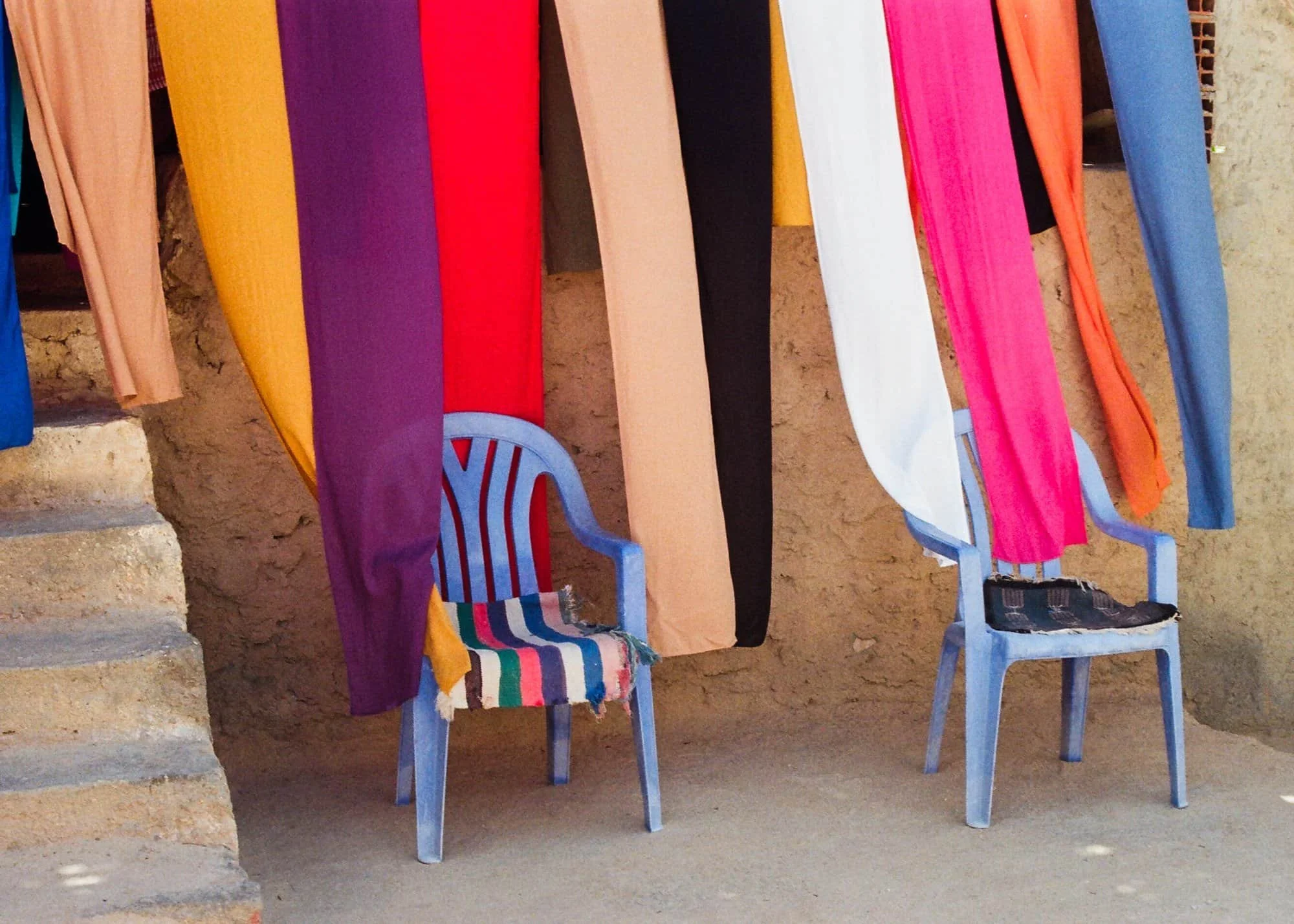 two chairs in the desert in Tunisia representing how relationship therapy can help isolation