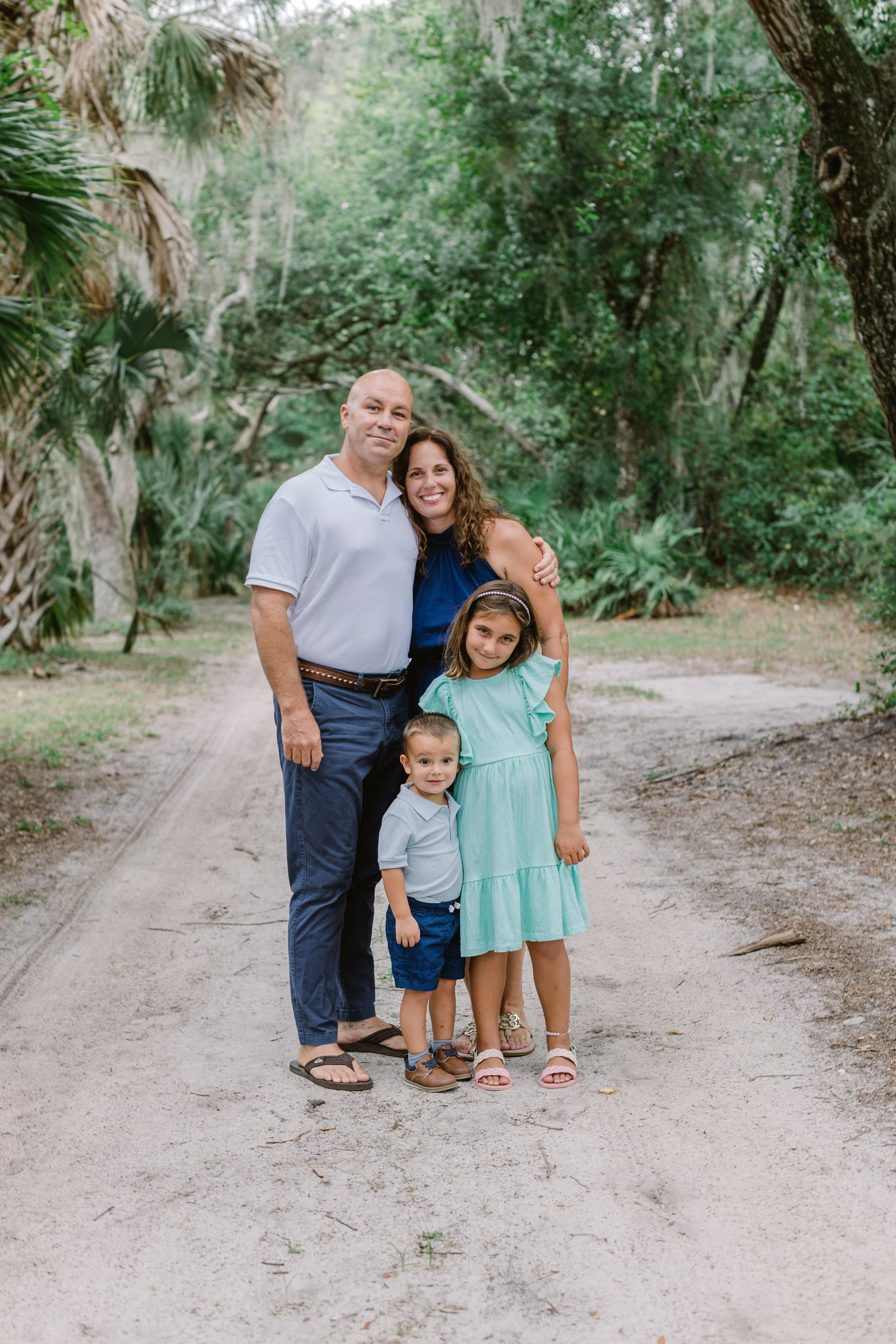 Tyler Fowler, Bella Pool Owner, with family