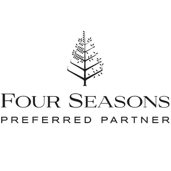 Logo with a stylized tree and the words 'Four Seasons Preferred Partner' beneath it.