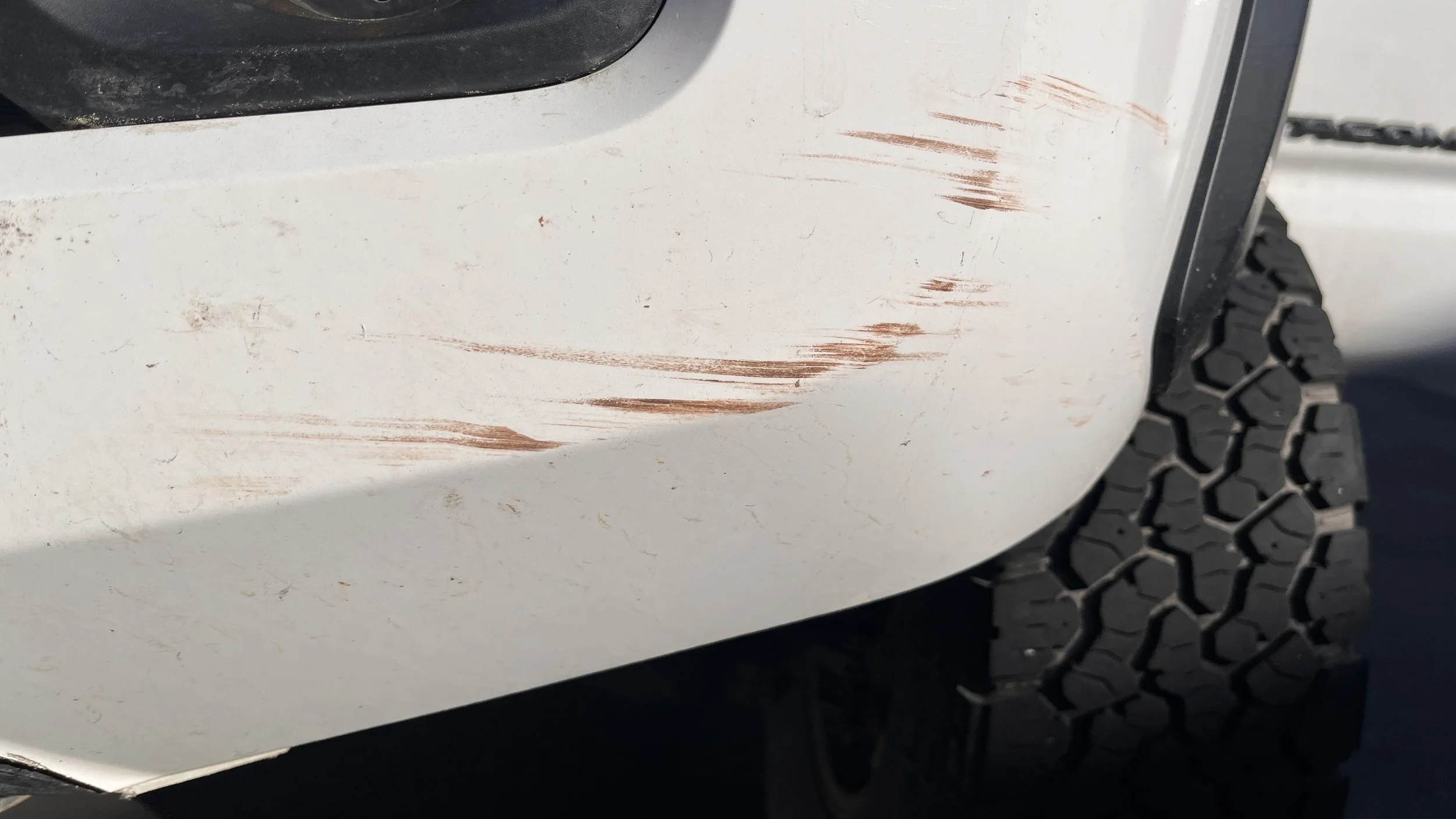 Scuffs on front driver side bumper (might buff out, never tried)