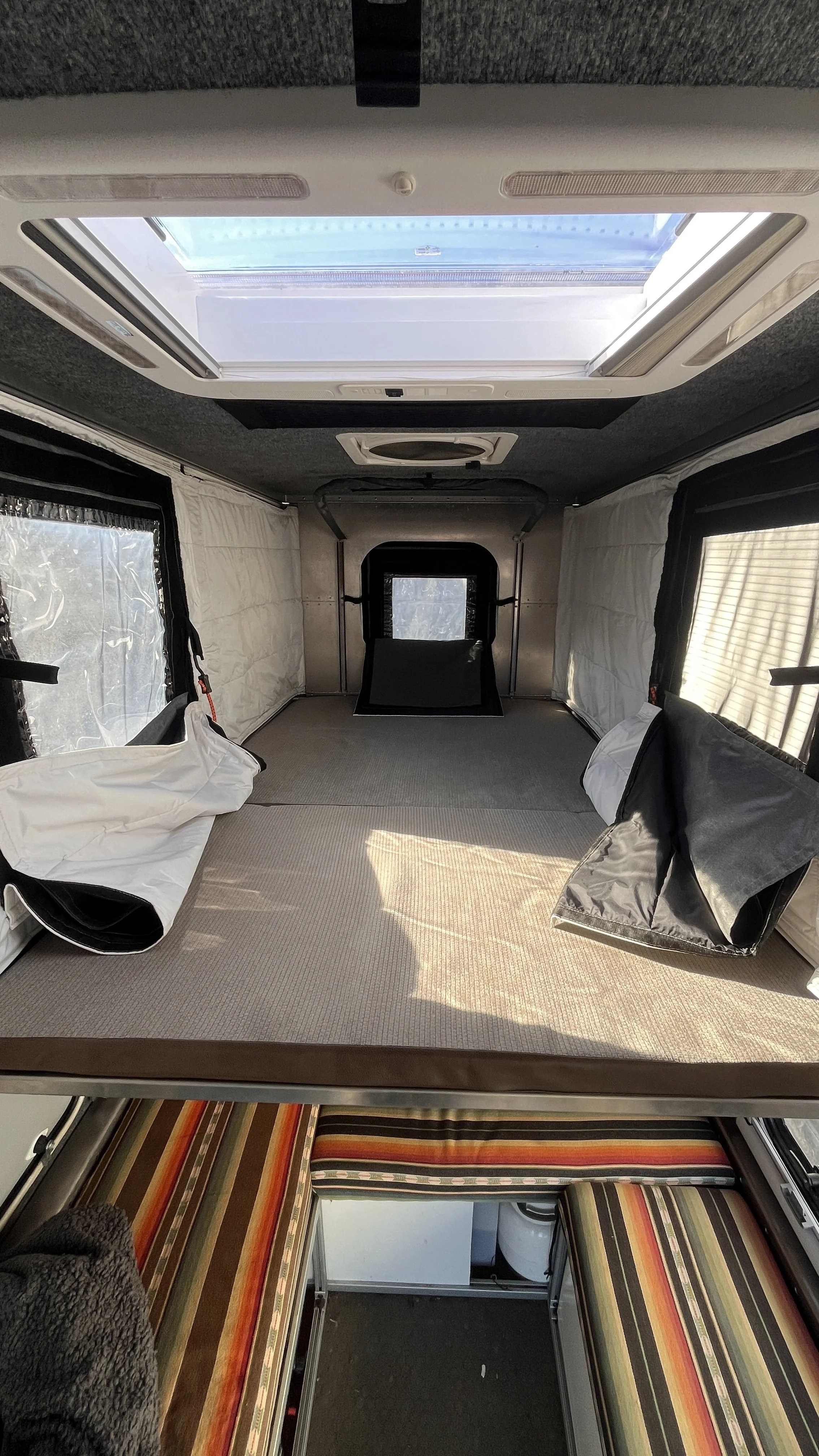 sleeping setup with windows open