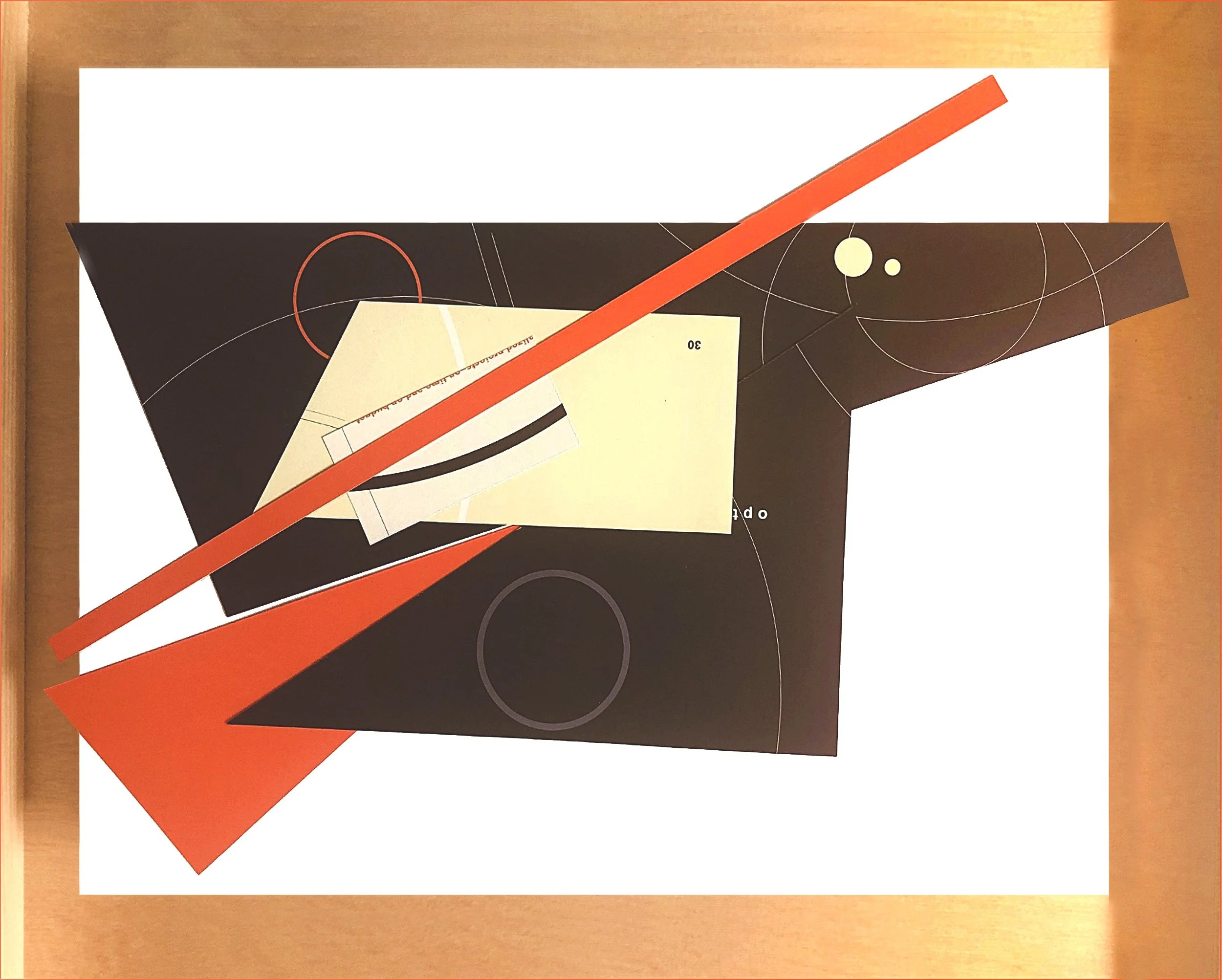 Abstract geometric collage with various shapes including triangles, circles, lines, and rectangles in black, white, and shades of red and orange, arranged on a flat surface.