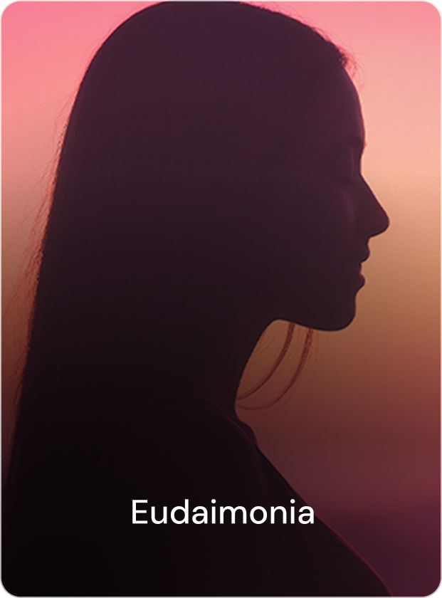 Close-up of a woman with curly blonde hair, eyes closed, face turned slightly to the side, outdoors with a clear sky background.