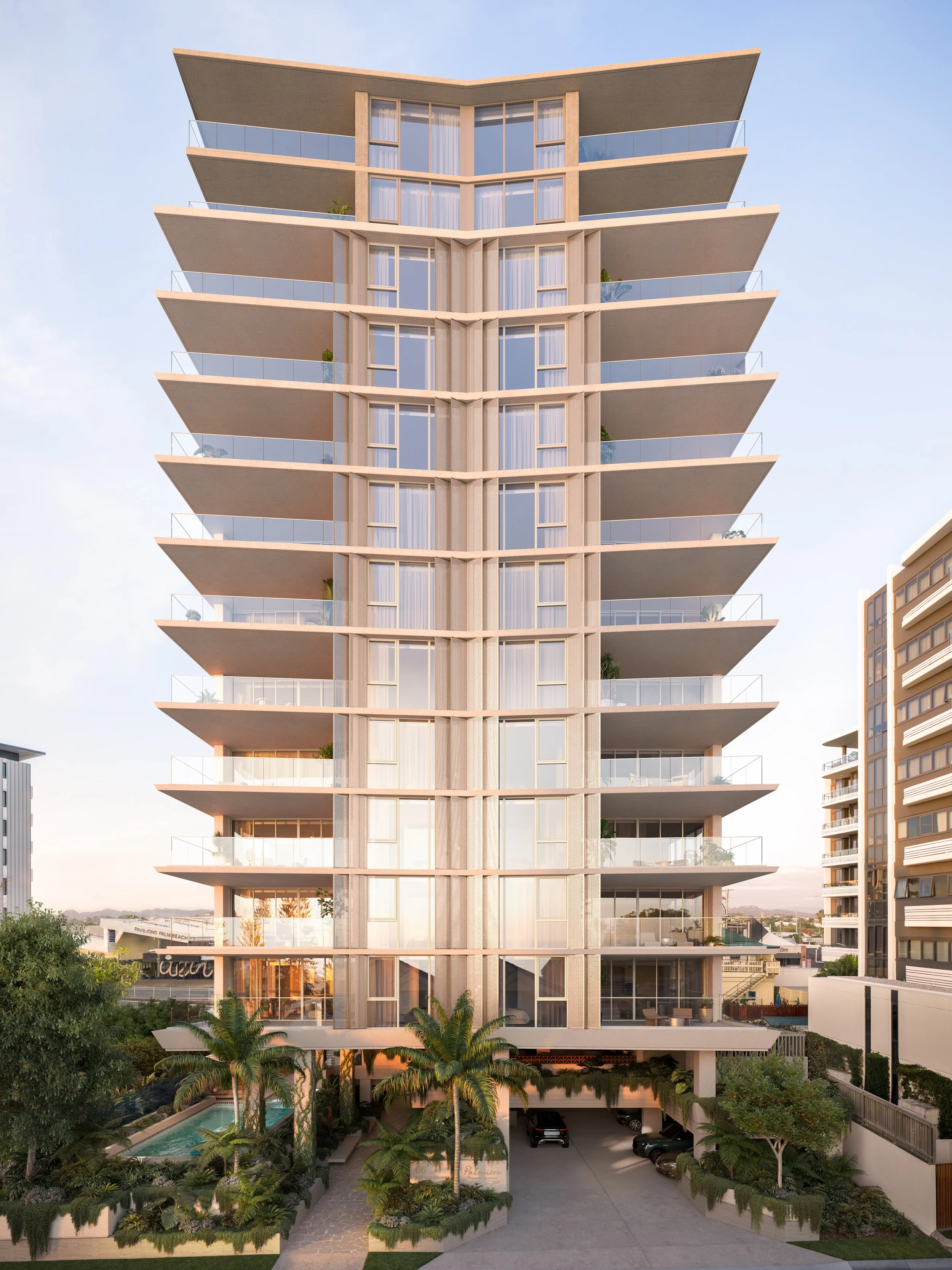 A modern multi-story residential building with large glass windows and spacious balconies. The building is situated in an urban area with palm trees, a pool, and parking area at the front.