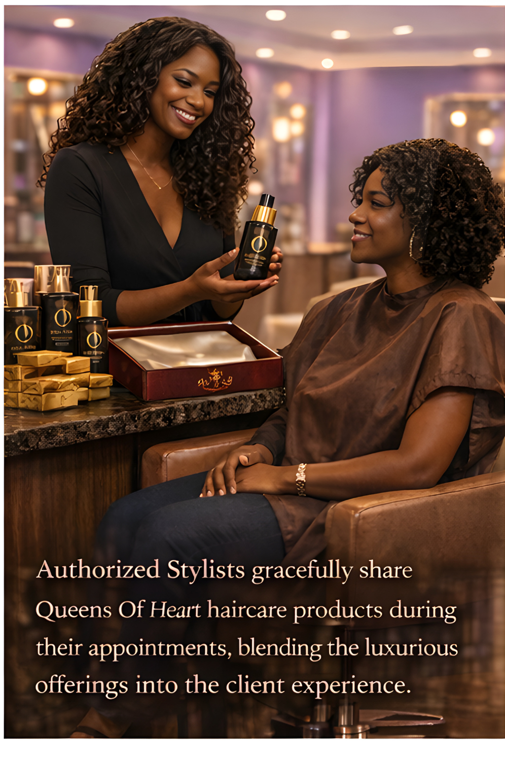 Two women at a salon, one stylist showing haircare products to the other client. The stylist holds a black and gold bottle, with other similar products on the counter. The client smiles, sitting in a chair, wearing a brown top and jewelry. The salon interior is warmly lit with a luxurious ambiance.
