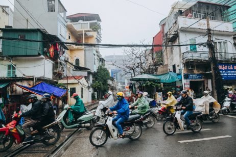 People riding motorbikes in Hanoi, Vietnam