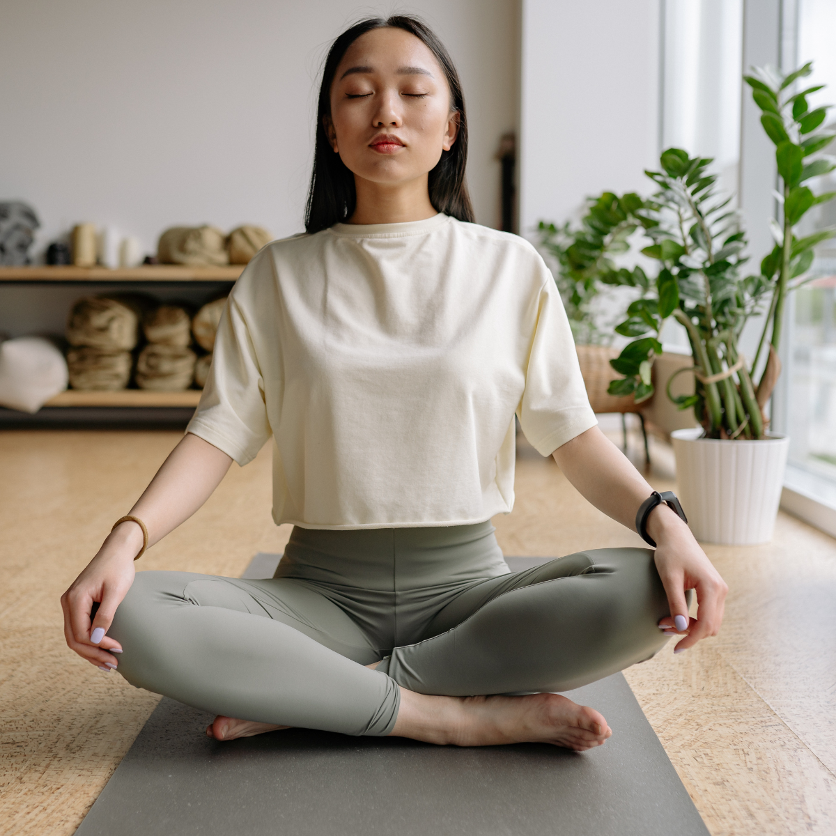 A woman sitting in a calm, grounded meditation pose with eyes closed, representing the quiet, patient work of rebuilding self-trust and reconnecting with your own voice after years of ADHD masking and self-erasure.