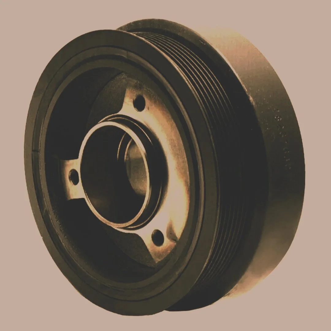 Precision rubber engine damper pulley by Nixon’s Rubber Moulding Trinidad — reduces vibration and enhances performance.
