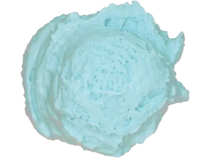 A light blue, rough-textured ice cube with an uneven shape.