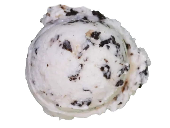 A scoop of cookies and cream ice cream with visible cookie pieces.