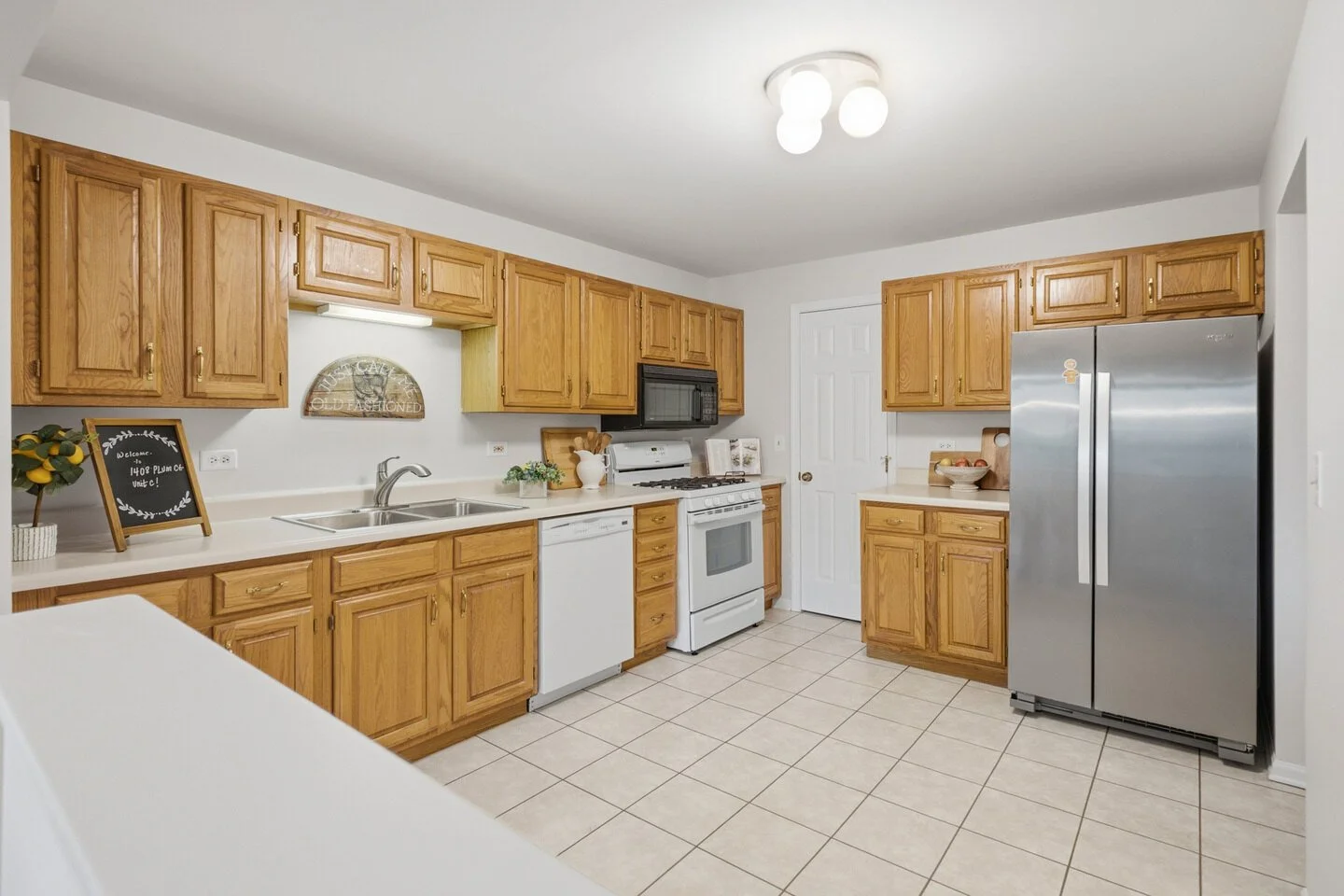 Kitchen with full cabinetry in a Mount Prospect coach home.jpg